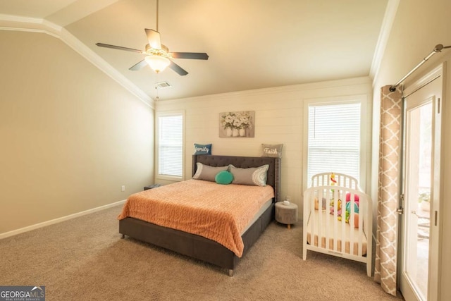 bedroom featuring multiple windows, crown molding, and carpet