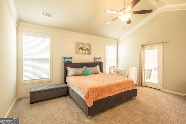 bedroom with light carpet, lofted ceiling, ceiling fan, and ornamental molding