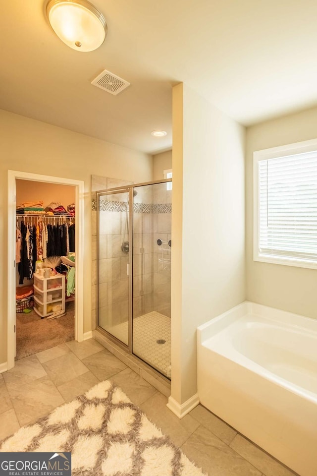 bathroom with plus walk in shower