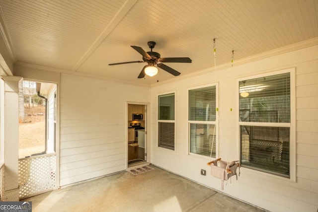 view of patio featuring ceiling fan