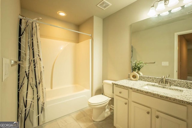 full bathroom featuring toilet, vanity, and shower / tub combo