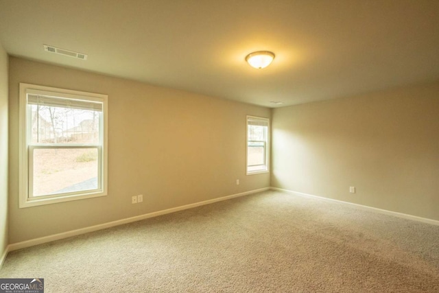 view of carpeted spare room