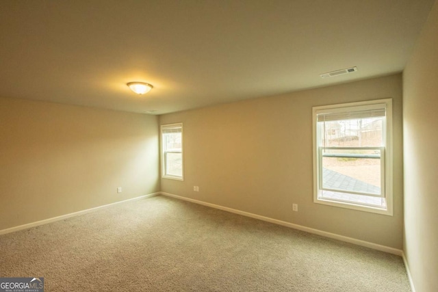 view of carpeted spare room