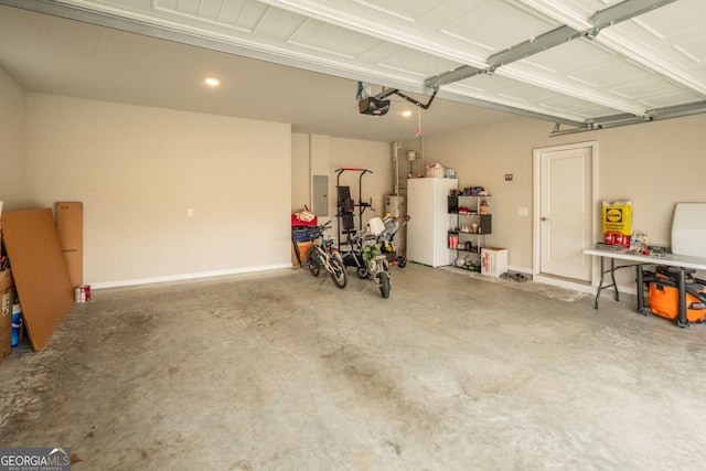 garage with electric panel and a garage door opener