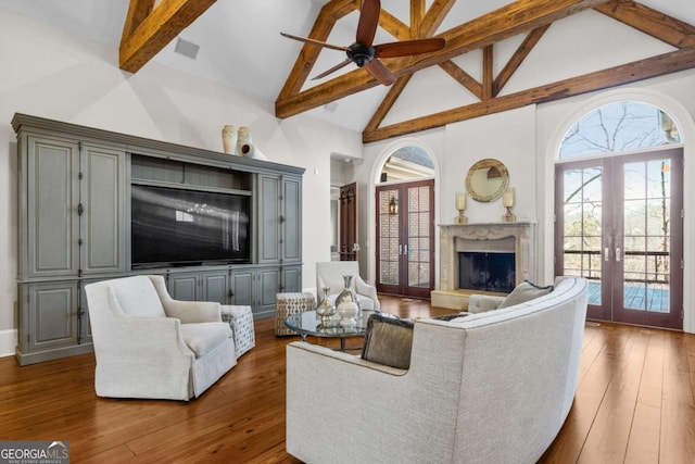 4080 Ryckeley Dr, Gainesville, GA 30504 - living area featuring french doors, high vaulted ceiling, hardwood / wood-style floors, and a ceiling fan