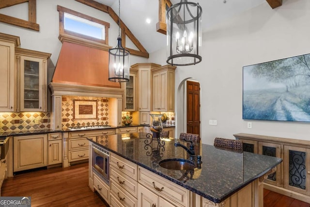 4080 Ryckeley Dr, Gainesville, GA 30504 - kitchen featuring a sink, cream cabinets, appliances with stainless steel finishes, and a kitchen island with sink
