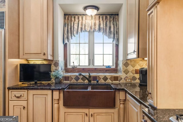4080 Ryckeley Dr, Gainesville, GA 30504 - kitchen featuring a sink, dark stone counters, and tasteful backsplash