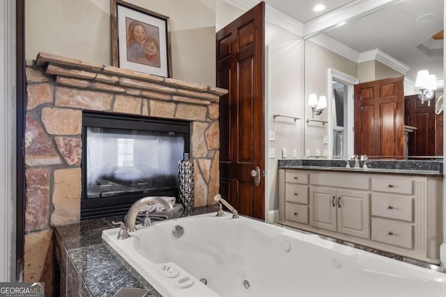 4080 Ryckeley Dr, Gainesville, GA 30504 - full bathroom with a whirlpool tub, a fireplace, vanity, and ornamental molding