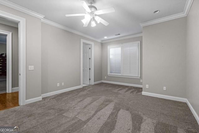 4080 Ryckeley Dr, Gainesville, GA 30504 - carpeted empty room with visible vents, a ceiling fan, baseboards, and ornamental molding