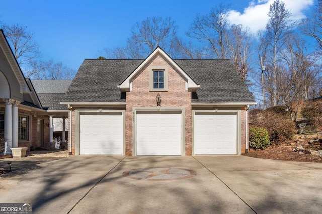 4080 Ryckeley Dr, Gainesville, GA 30504 - exterior space featuring driveway, a garage, brick siding, and roof with shingles