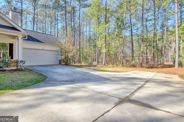 view of home's exterior featuring a garage