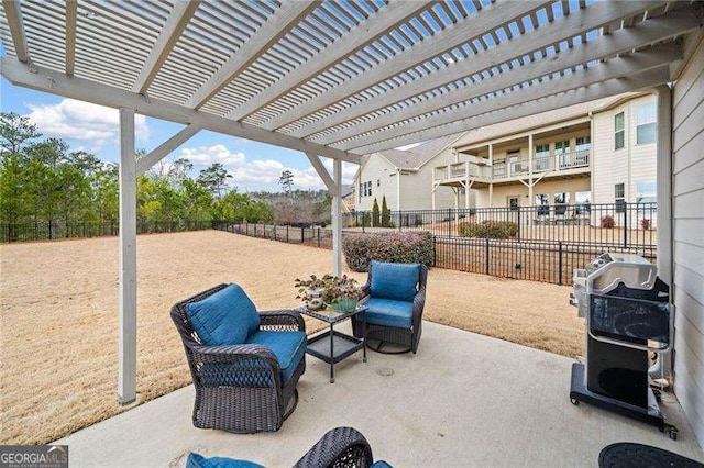 view of patio / terrace with a fenced backyard, grilling area, and a pergola