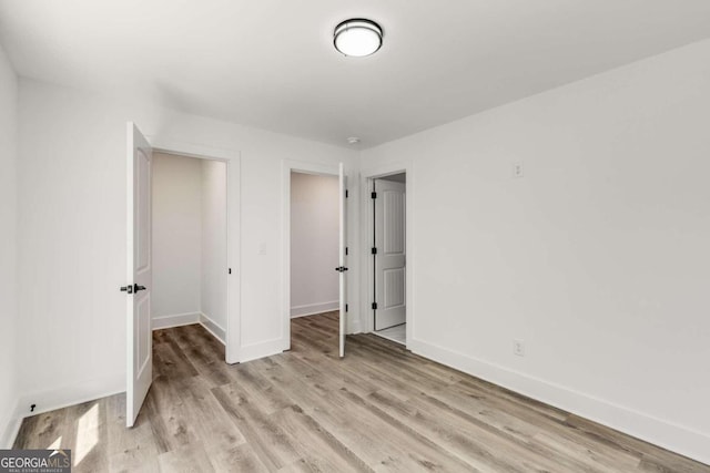 unfurnished bedroom featuring light hardwood / wood-style flooring