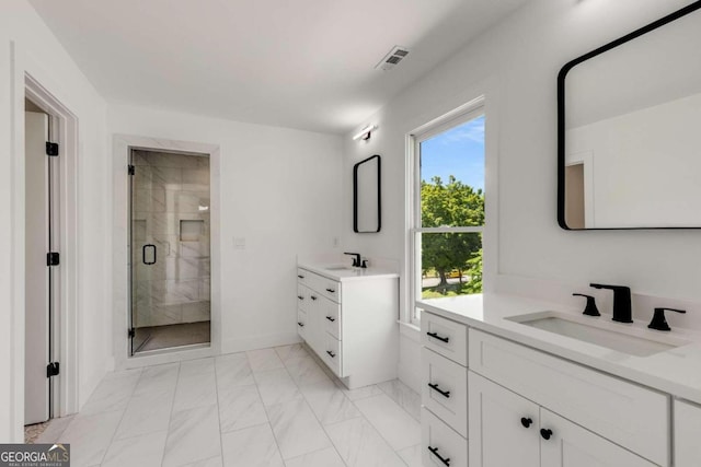 bathroom with vanity and walk in shower