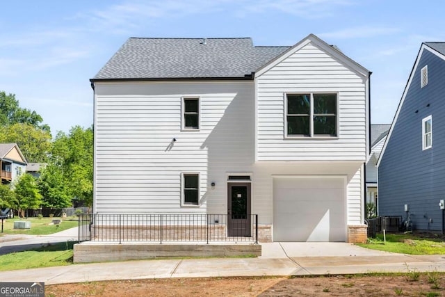 view of front of home with a garage