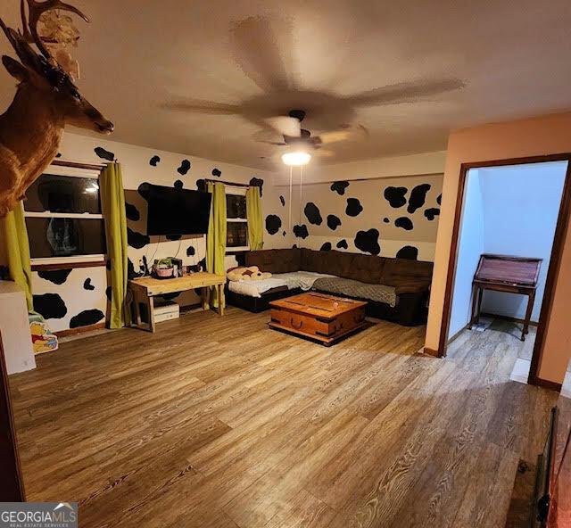 249 Ponderosa Ln, Barnesville, GA 30204 - living room with ceiling fan and wood-type flooring
