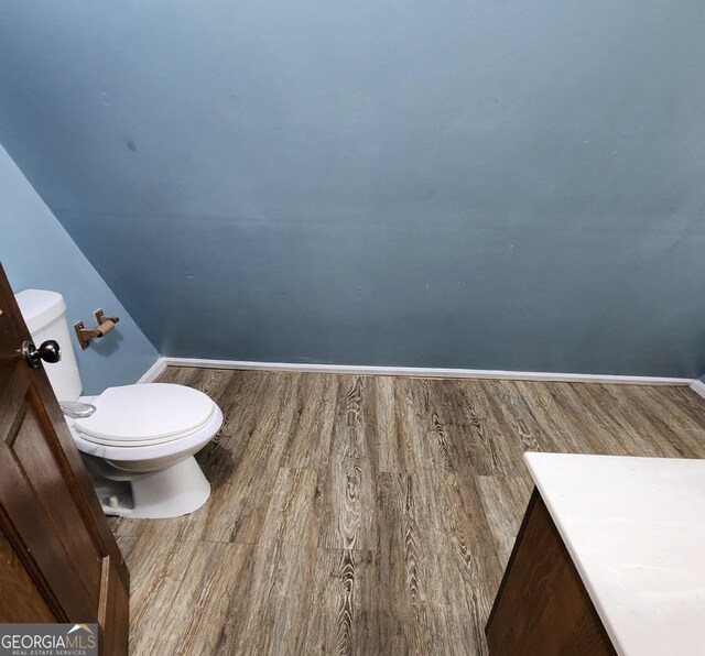 249 Ponderosa Ln, Barnesville, GA 30204 - bathroom featuring hardwood / wood-style flooring and toilet