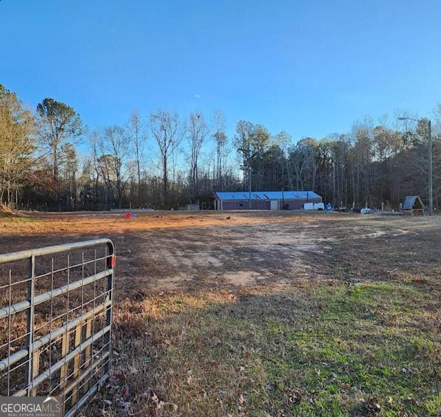 249 Ponderosa Ln, Barnesville, GA 30204 - view of yard with a rural view