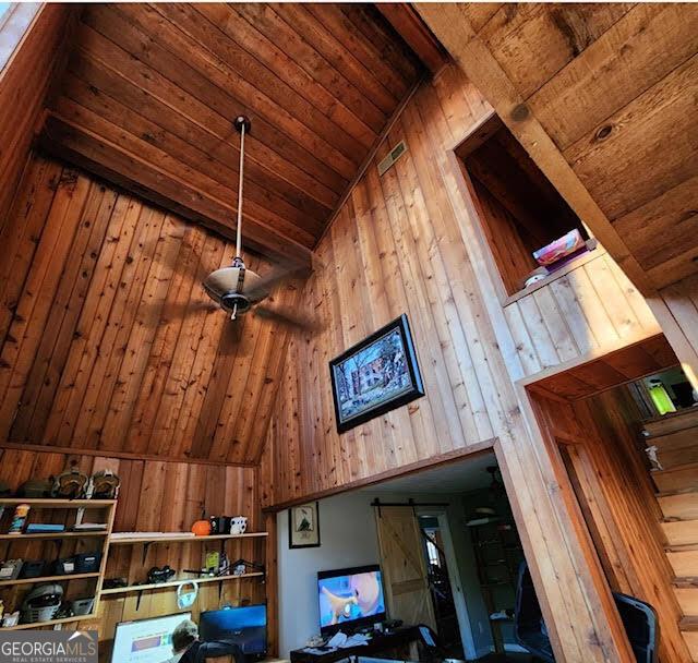 249 Ponderosa Ln, Barnesville, GA 30204 - room details with wooden walls and wooden ceiling