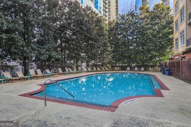 1101 Juniper St NE Unit 722, Atlanta, GA 30309 - community pool with a patio