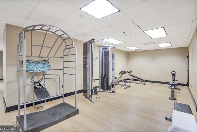 1101 Juniper St NE Unit 722, Atlanta, GA 30309 - workout area with wood finished floors and a paneled ceiling