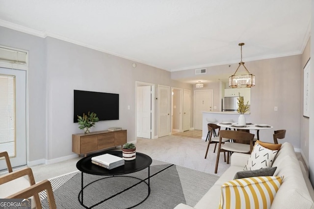 1101 Juniper St NE Unit 722, Atlanta, GA 30309 - living area featuring light carpet, ornamental molding, and a chandelier