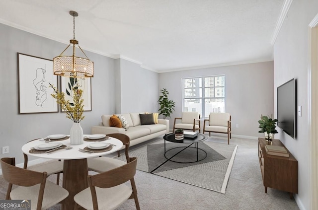 1101 Juniper St NE Unit 722, Atlanta, GA 30309 - carpeted living room featuring a chandelier and crown molding