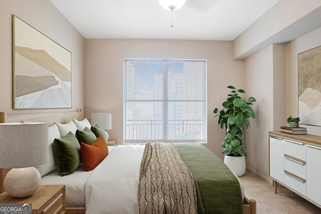1101 Juniper St NE Unit 722, Atlanta, GA 30309 - bedroom with multiple windows and light carpet