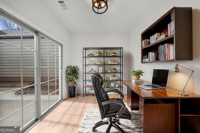 office space featuring light hardwood / wood-style floors