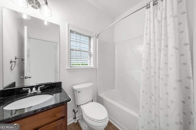 full bathroom featuring toilet, vanity, and shower / bath combination with curtain