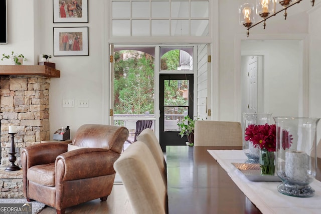 living room featuring hardwood / wood-style floors and an inviting chandelier