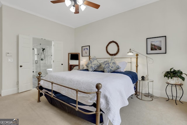 bedroom featuring light carpet, ceiling fan, crown molding, and connected bathroom