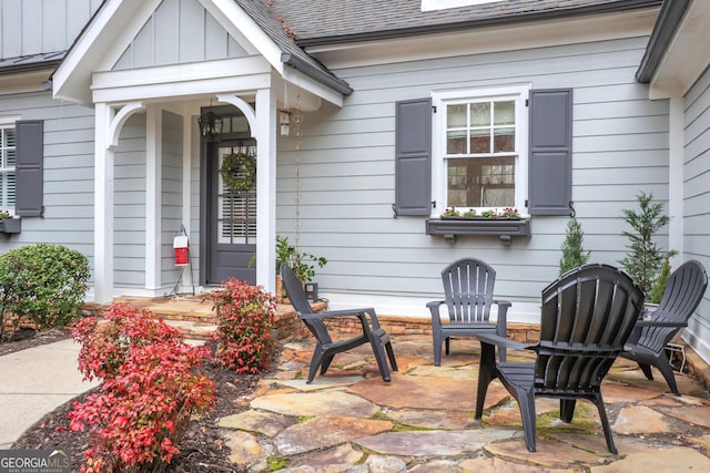 doorway to property with a patio