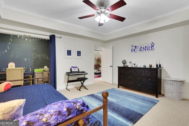 carpeted bedroom with ceiling fan and crown molding