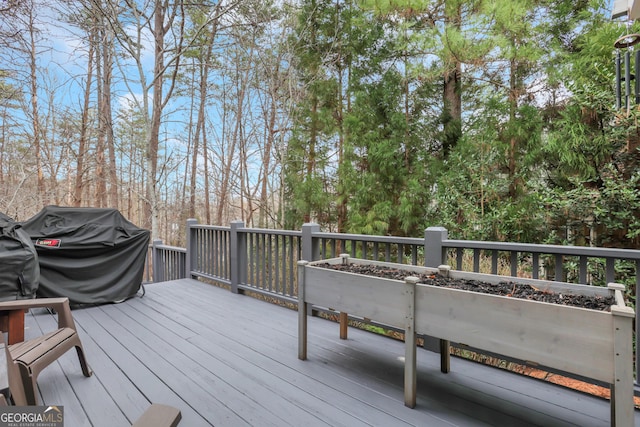 wooden terrace with grilling area