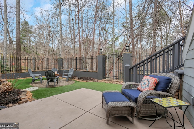 view of patio / terrace with a fire pit