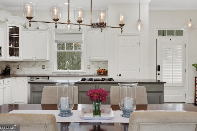 kitchen with sink, gray cabinets, white cabinetry, hanging light fixtures, and stainless steel gas stovetop