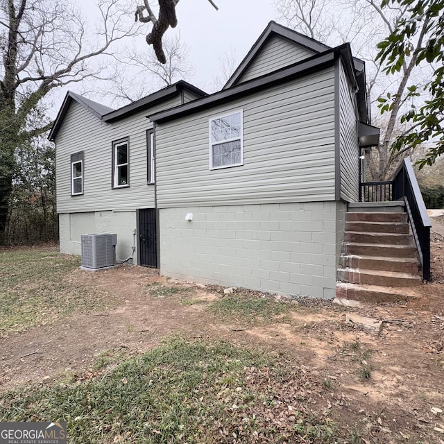 view of property exterior featuring central air condition unit