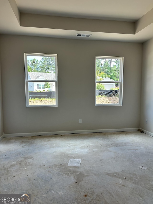 9 Wildflower Ln Unit 41, Dallas, GA 30132 - spare room featuring concrete flooring, plenty of natural light, and baseboards