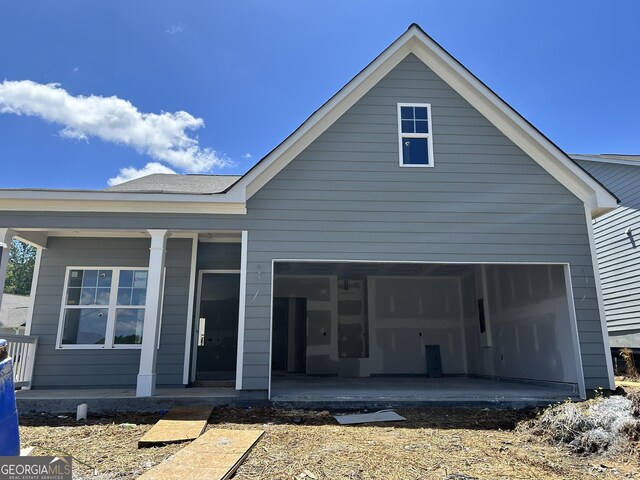 9 Wildflower Ln Unit 41, Dallas, GA 30132 - rear view of house with covered porch