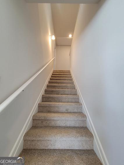 stairway with carpet floors