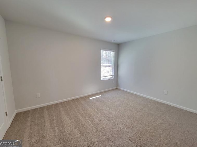 view of carpeted spare room