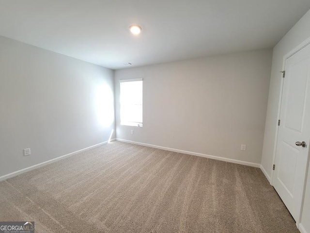 unfurnished bedroom with carpet flooring