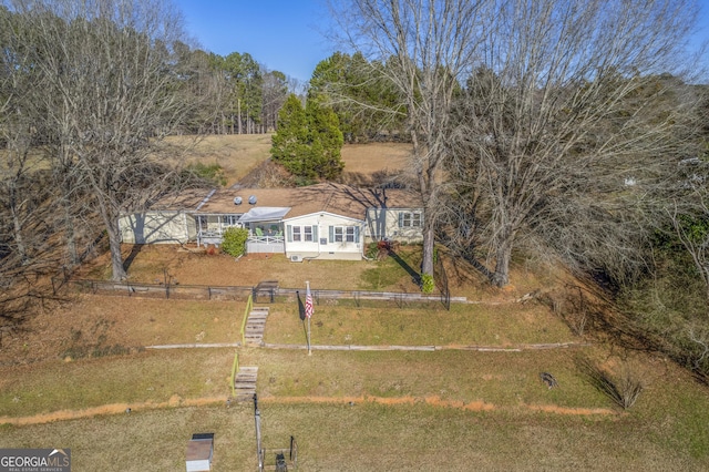 birds eye view of property featuring a rural view