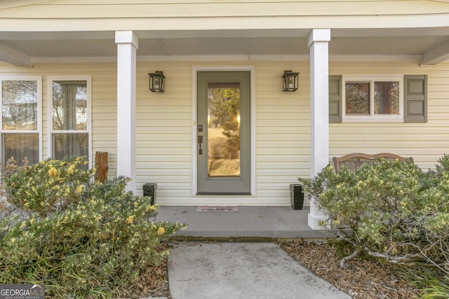 entrance to property with a porch