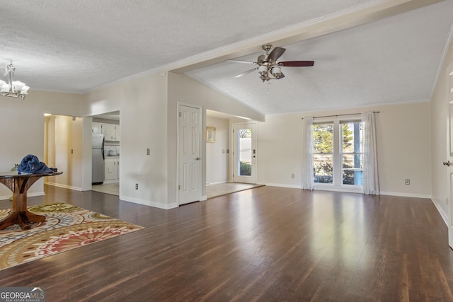 living room with a textured ceiling, lofted ceiling, dark hardwood / wood-style flooring, and ceiling fan with notable chandelier