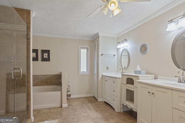 bathroom featuring a textured ceiling, ceiling fan, shower with separate bathtub, crown molding, and vanity