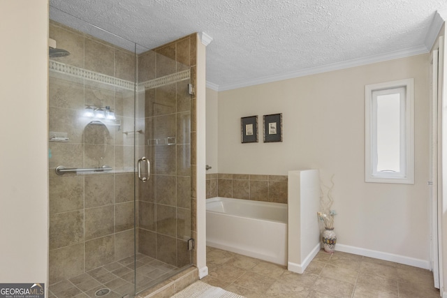 bathroom featuring a textured ceiling, ornamental molding, tile patterned flooring, and independent shower and bath