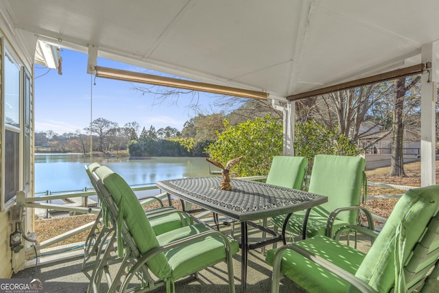 view of patio featuring a water view