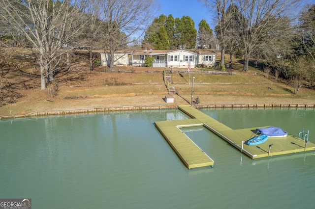 view of dock with a water view